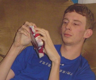 Joel opens gift